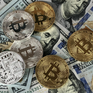 Bitcoin alla prova dei debiti: può la criptovaluta diventare la nuova riserva mondiale?