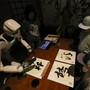Biennale di Venezia, al padiglione cinese gli ideogrammi li scrive un robot