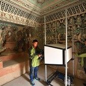 Cina, restauratori al lavoro per preservare le grotte di Mogao